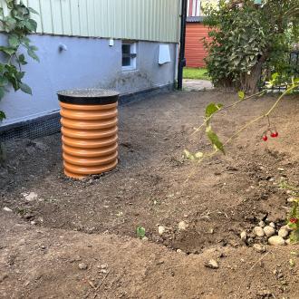 WaBack® Access backwater valve chamber installed next to a home in Enskede, Sweden