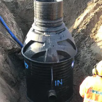 completed-underground-cistern-installation-access-cover-halmstad-residential-wareg-us Completed underground cistern installation with access cover in Halmstad residential development