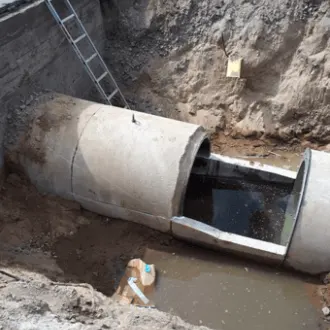 wapro-inline-check-valve-sweden-prevent-high-water-levels-backflow-with-wastop-us WaStop inline check valve installed in concrete overflow pipe to stop sea-level-induced backflow in Sweden.