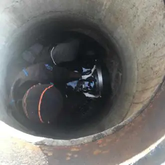 wapro-wastop-stormwater-backflow-control-checkvalve-ahus-port-us WaStop check valve installed in manhole to prevent seawater intrusion at Åhus Port
