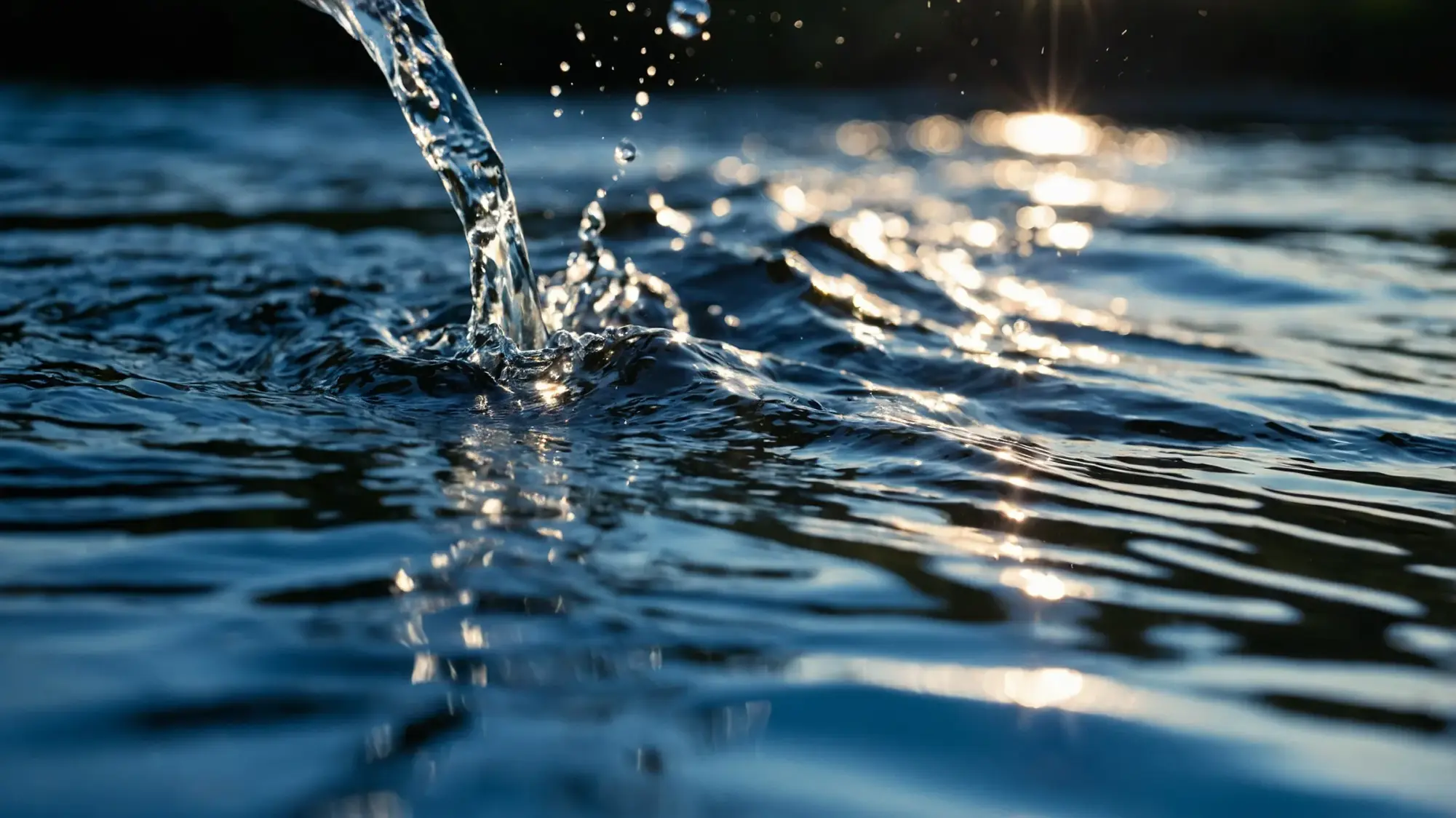 Stream of water splashing into a backlit surface, asking how well prepared your community is before the next flood